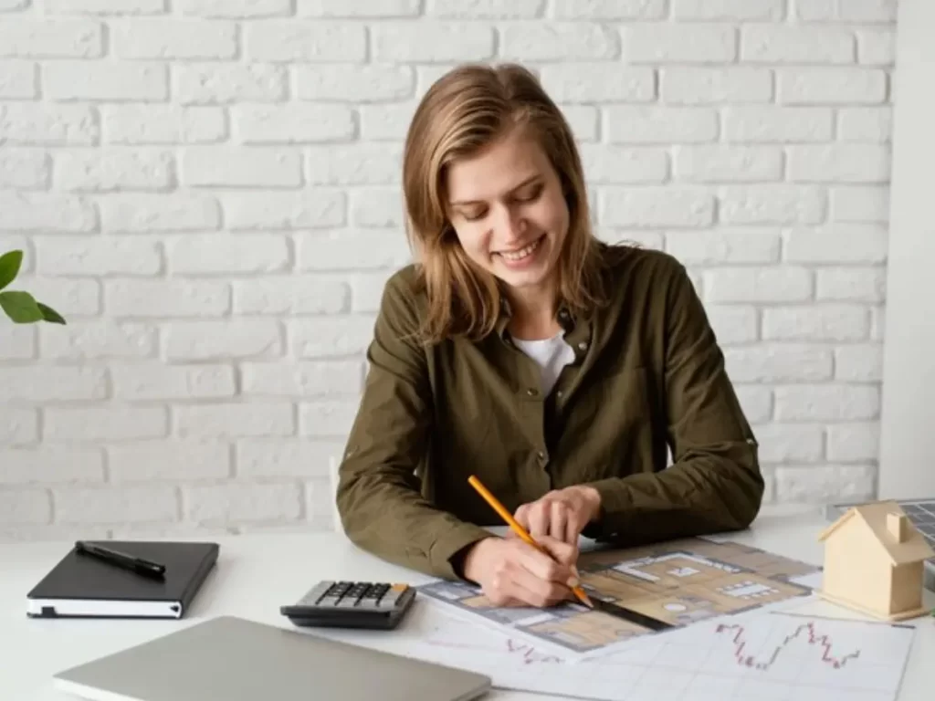 mulher calculando para investir