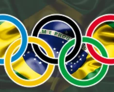 logotipo das olimpiadas na frente da bandeira brasileira